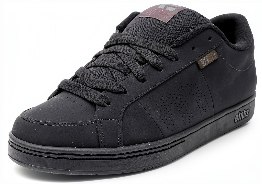 etnies Kingpin skate shoe on a skateboard deck